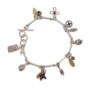 Silver and Gold Birdsong charm bracelet by Martyn Milligan Rinopai Golden Bay