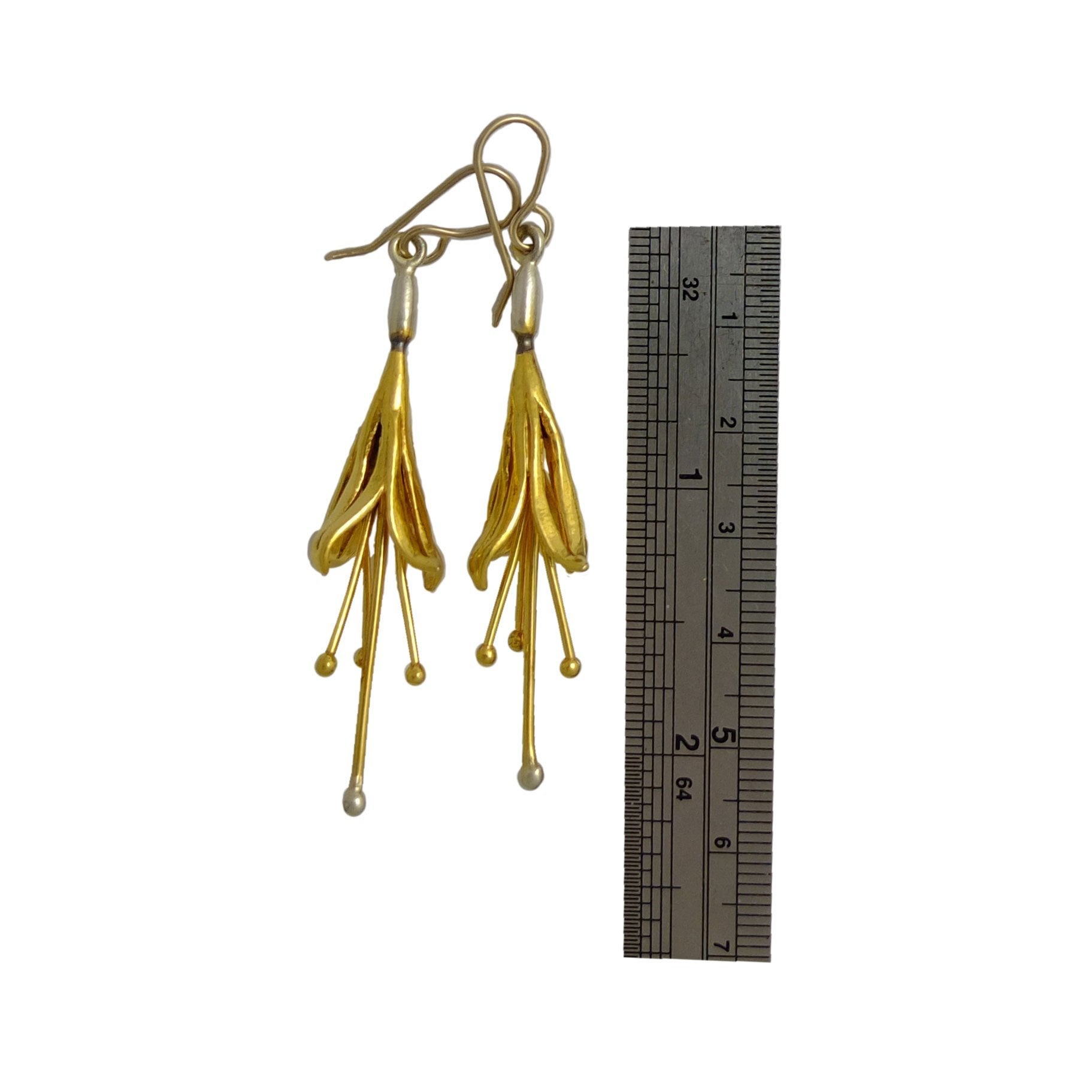 ruler size Kōtukutuku earrings, silver with a gold vermiel surface