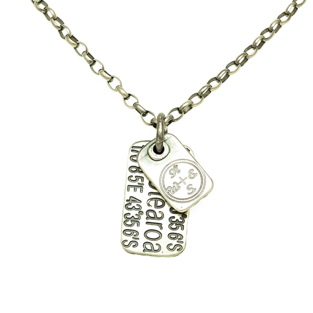 Aotearoa Sterling Silver Custom Engraved GPS Tags by jewellery nz designer Martyn Milligan